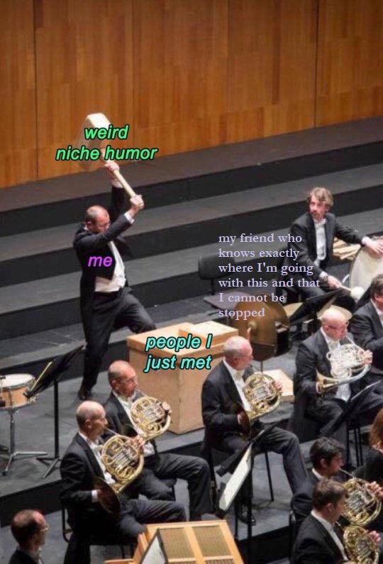 Image of the percussion section of the orchestra where a percussionist is about to slam down a mallet on wood behind the unsuspecting french horn section as the bass drummer looks on from the side
